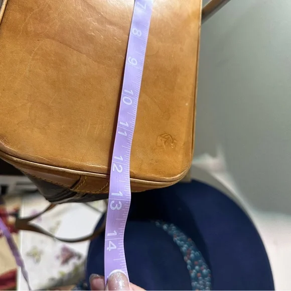 Louis Vuitton Brown and Tan Monogram with strap and keychain charm - Picture 13 of 13